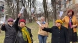 Russia - a humorous video on TVK showed pensioners trying to ward off the coronavirus - Fake News law - screen grab
