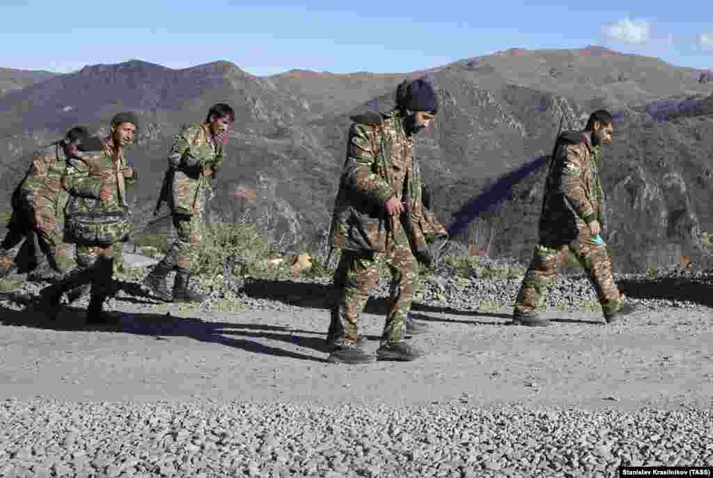 Unidentified servicemen head toward Armenia on November 8, 2020, the day Azerbaijani President Ilham Aliyev announced that Azerbaijani forces had retaken control of Shusha (Shushi in Armenian). Although Armenian President Nikol Pashinian maintains that fighting continues there, Karabakh&#39;s de facto government has conceded that it has lost control of the town.&nbsp;