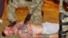 Yauhen (Yevgeny) Zaichkin, pictured here in a Reuters photo during the August 9, 2020 post-election protests in Minsk, Belarus was initially believed dead. 