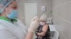 Russia's Regional COVID-19 Vaccination Campaign Gets Underway With Hopes For More Supplies